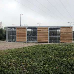 Projecten | Verhoogde fietsoverkapping bekleed met verschillende wandbekledingen | image #1 | 118831 fietsoverkapping fietsparkeren etagerek