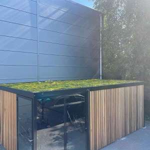 Projecten | Overkapping met groendak en aanleunbeugel met oplaadpunt voor bedrijf | image #1 | 122349_121651 fietsoverkapping groendak fietsaanleunbeugel oplaadpunt