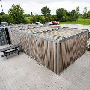 Projecten | Circulaire overkapping passend bij Circulaire bedrijfspand Colpro | image #1 | 116363 fietsparkeren fietsoverkapping overkapping berging